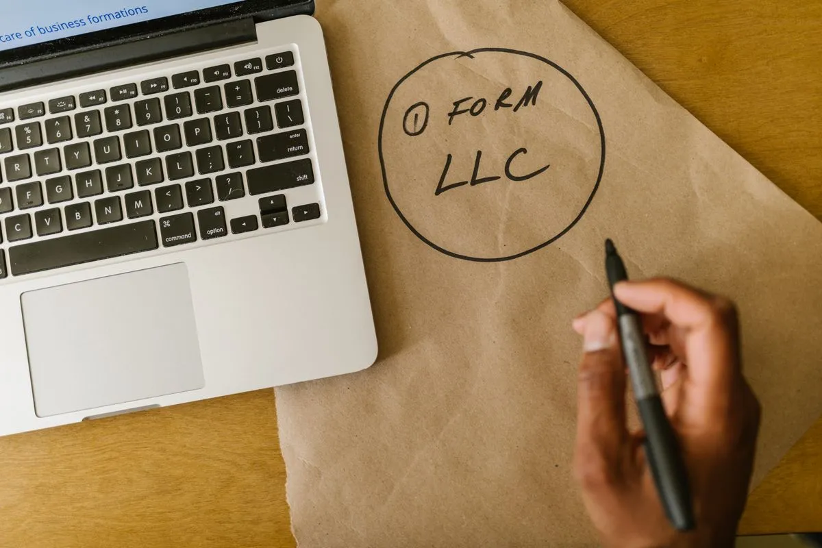 Founder reviewing LLC paperwork during a business registration service consultation