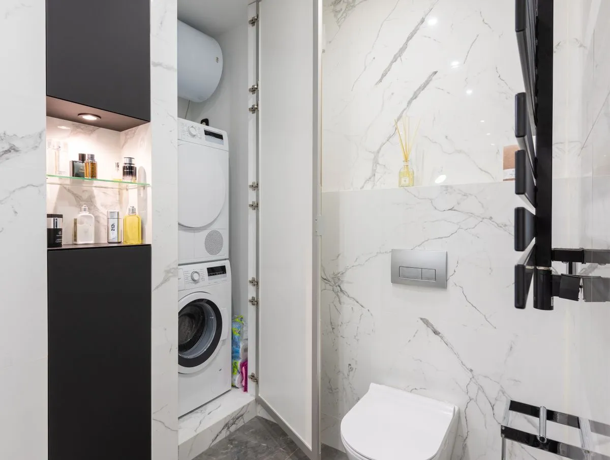 Clean laundry area after a completed appliance repair visit