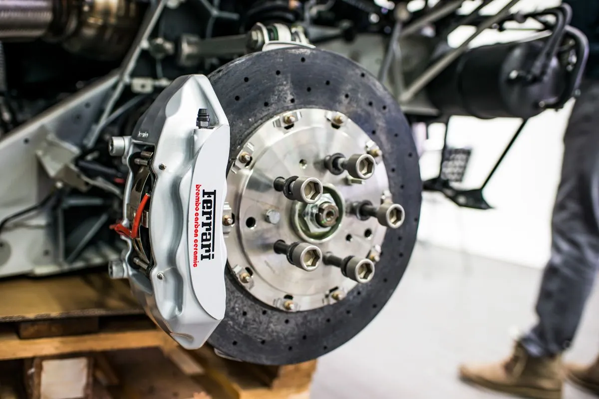 Fresh brake pad replacement parts arranged on a clean workbench
