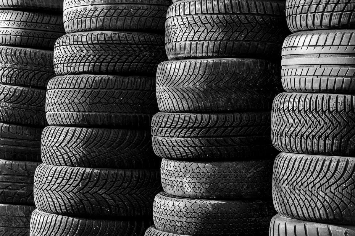 Tire rotation and balancing equipment in the service bay