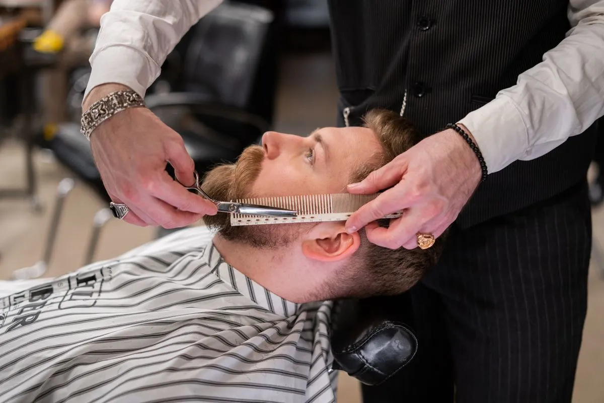 Polished beard trim and shave result in a modern barbershop