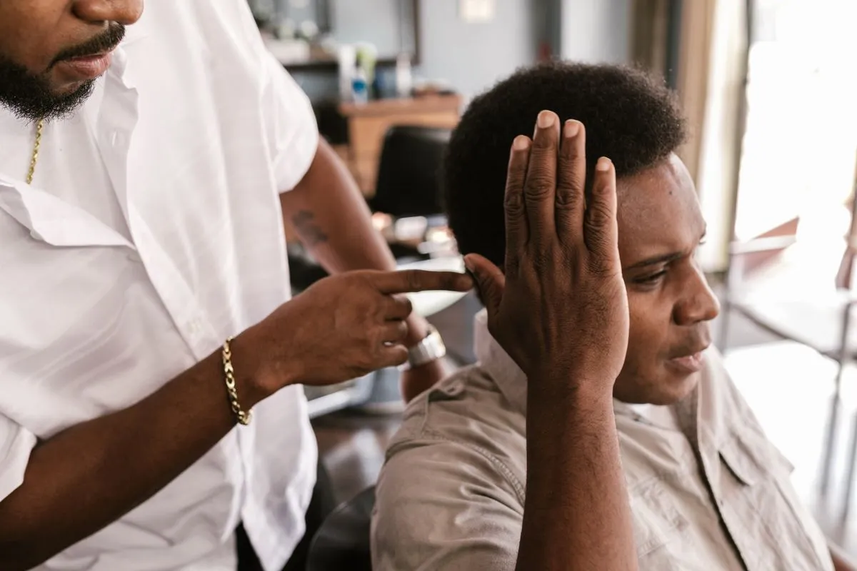 Beard trim and lineup in a classic barber shop chair