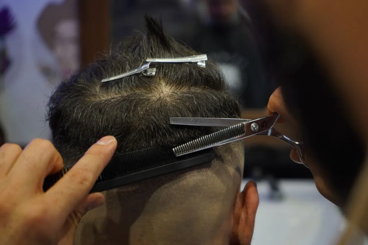 Close-up of blended grey coverage for a modern men's look