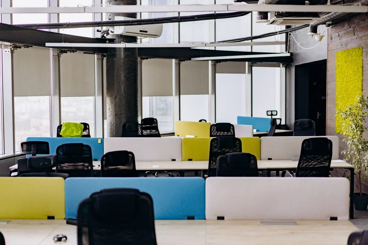 Professional office cleaning team servicing a modern workplace