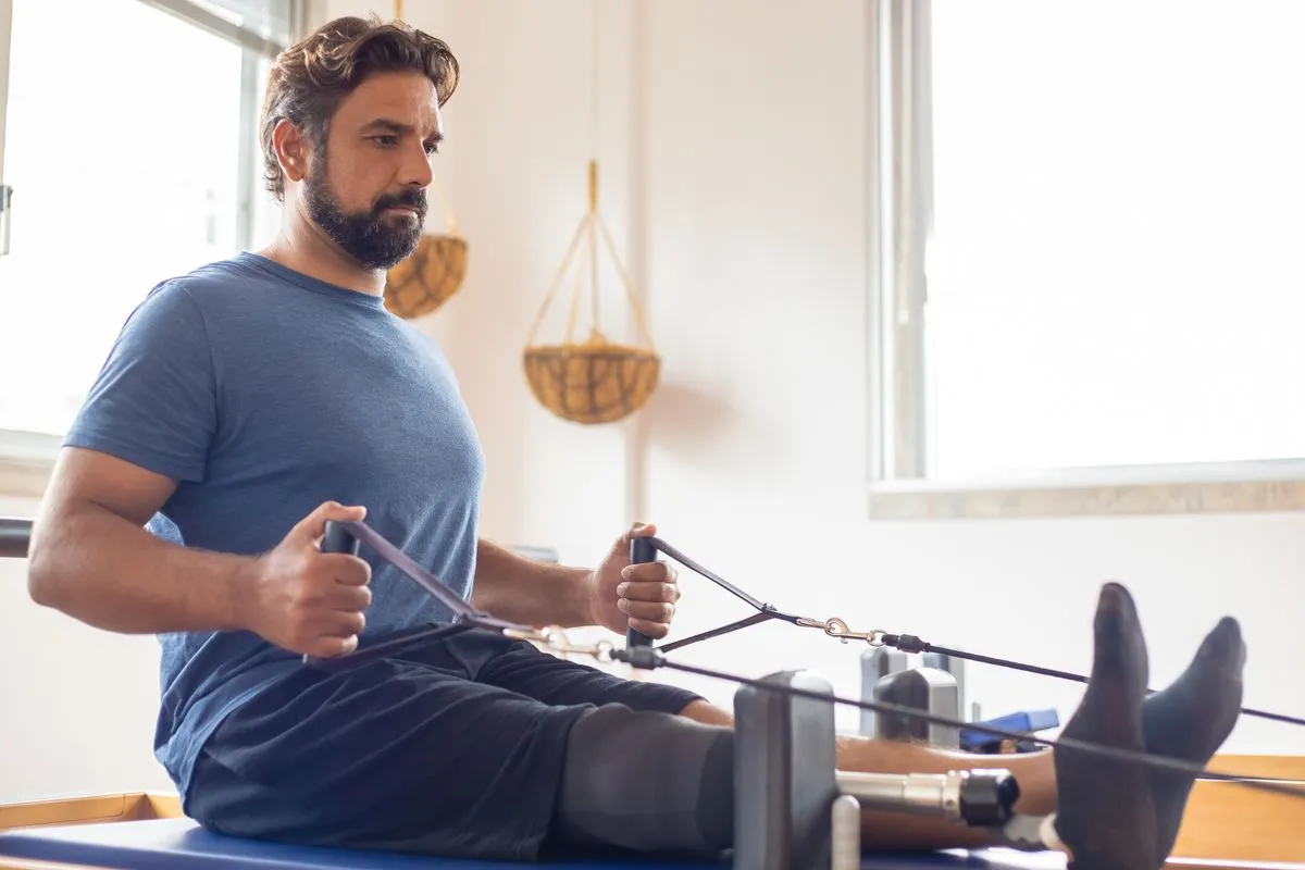 Physical therapist near me guiding a patient through mobility exercises
