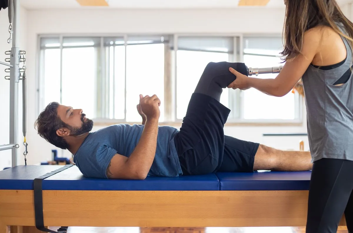 Athletic physical therapy session in a modern clinic