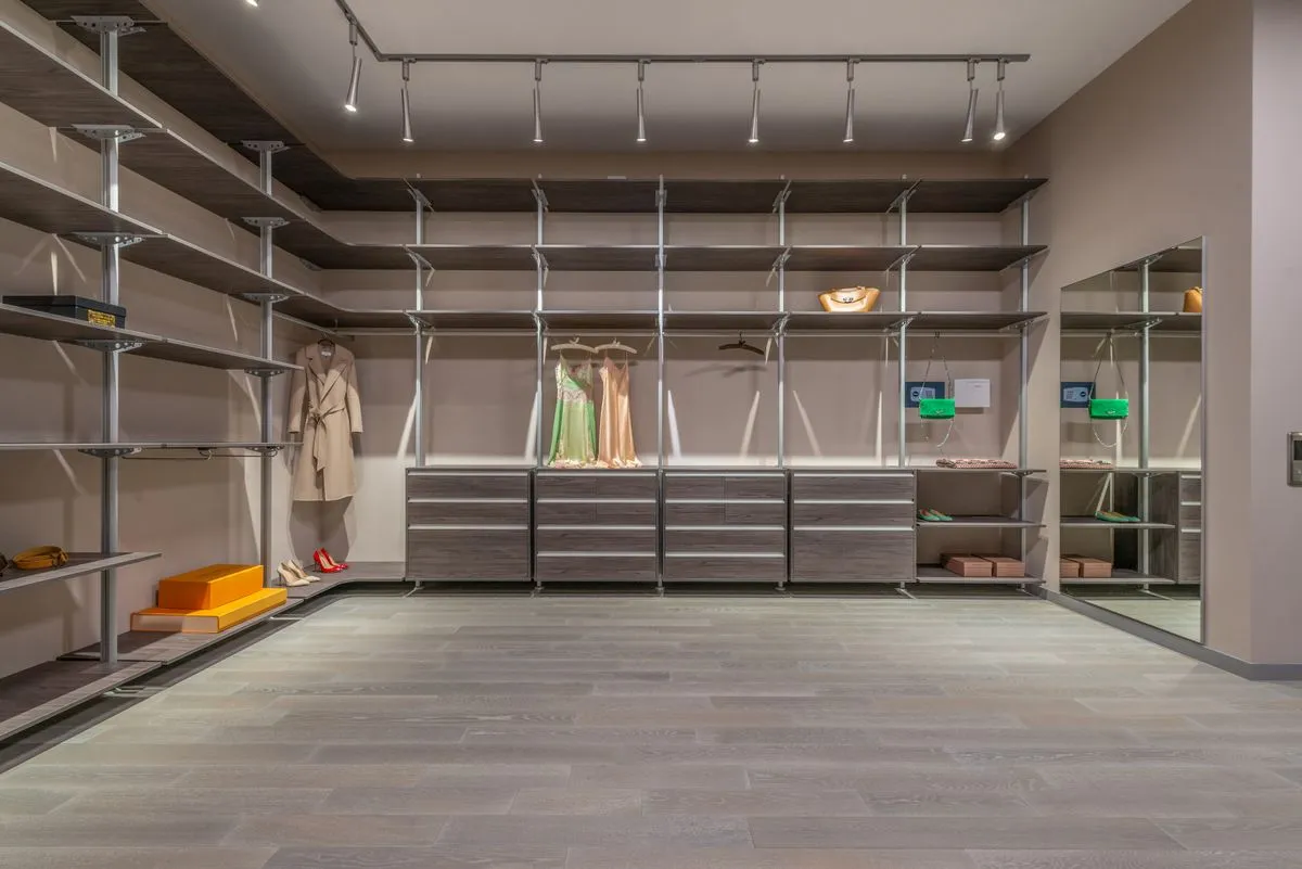 Modern custom closet systems with open shelves and soft-close drawers
