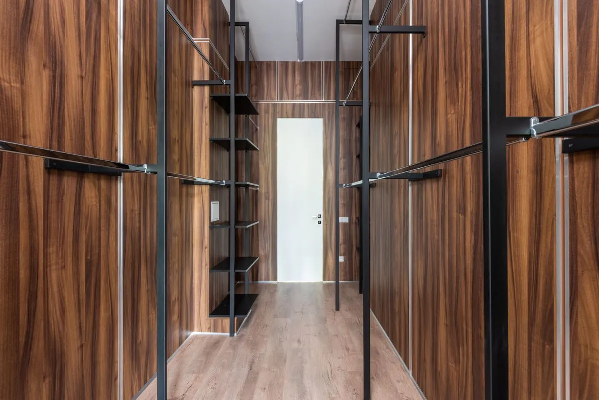 Stylish custom closet system with drawers, shelves, and hanging space