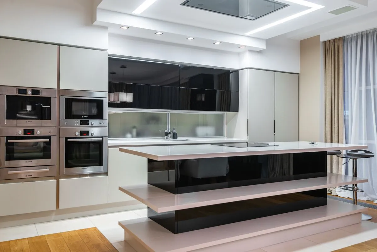 Tall pantry cabinet system with pull-out storage and soft-close drawers