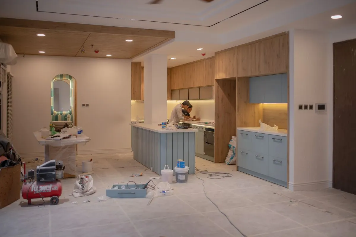 Elegant kitchen with custom kitchen cabinets and a finished island