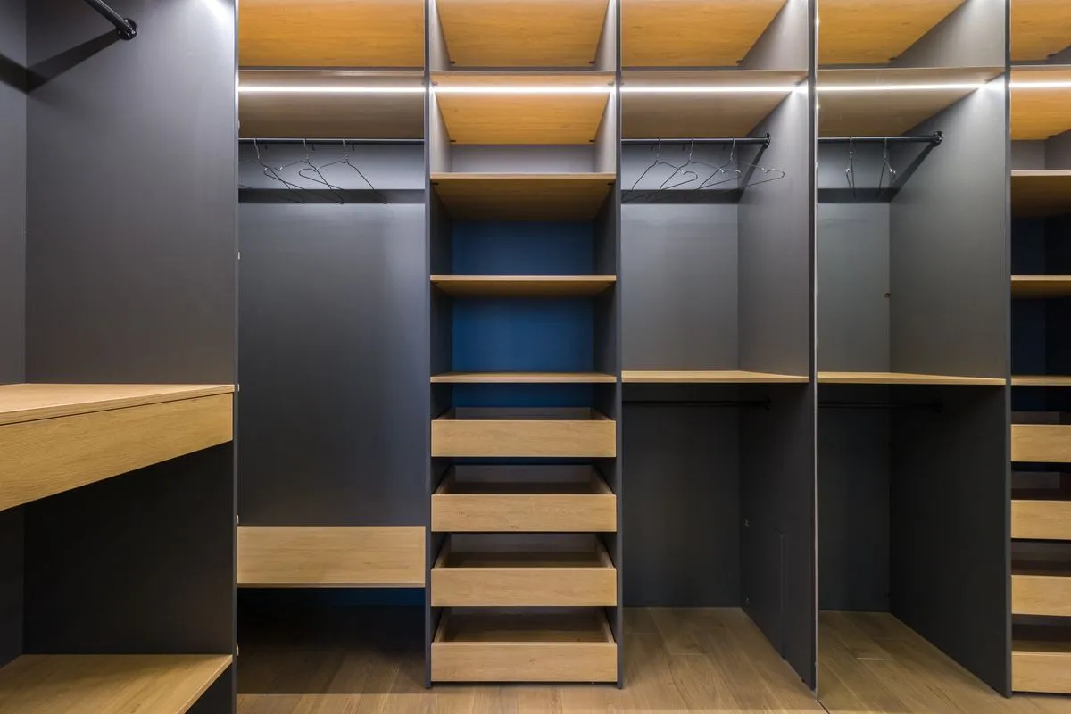 Furniture assembler near me completing a bed frame setup in a bright bedroom