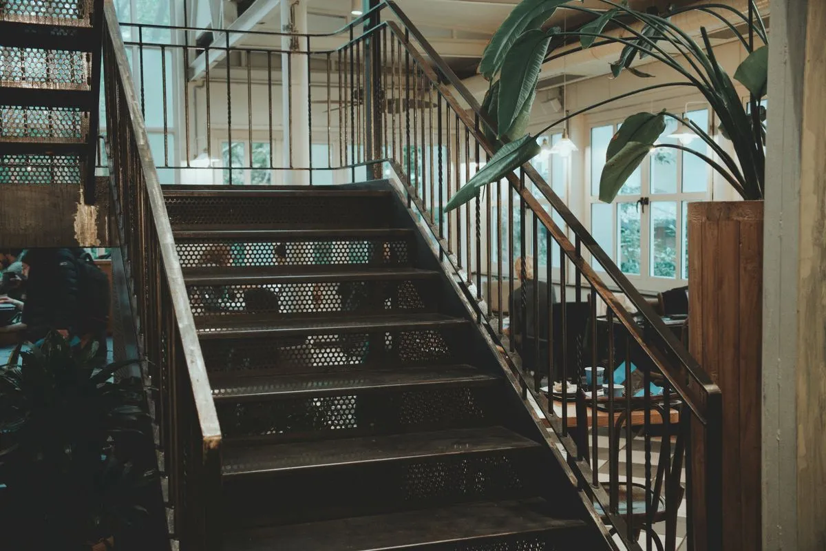 Floating staircase installation in a renovated loft space