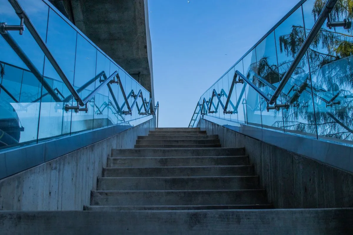 Accessible handrail installation for a commercial stairwell