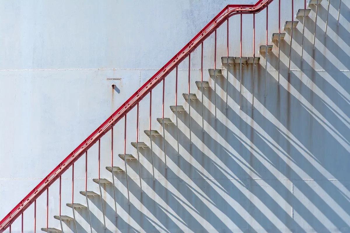Modern metal stair railing installed on an interior staircase