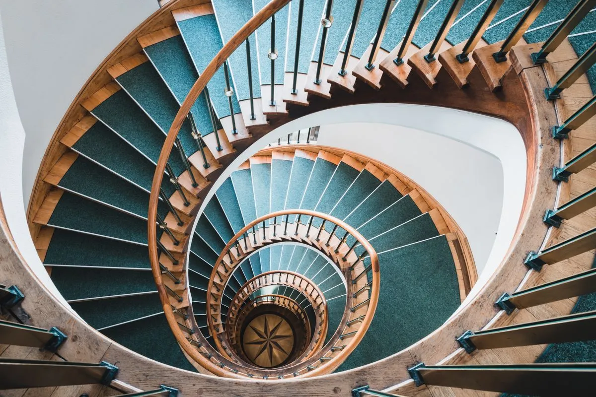 Replace carpet stairs with wood project in a modern hallway