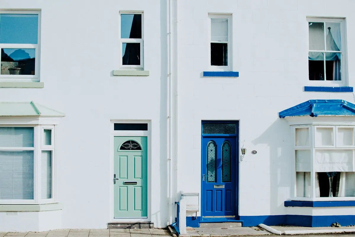 Modern front door replacement on a suburban home