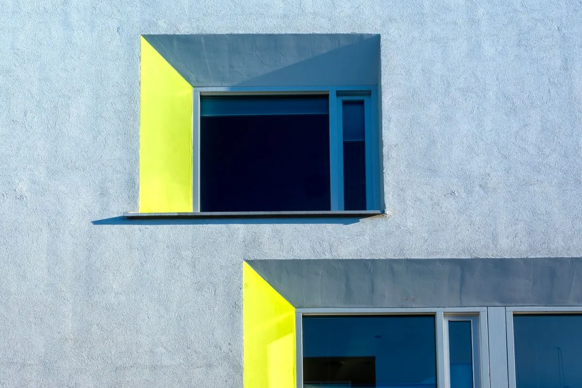 Close-up of vinyl window installation with sealed frame details