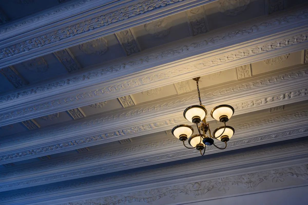 Finished coffered ceiling installation in a modern interior