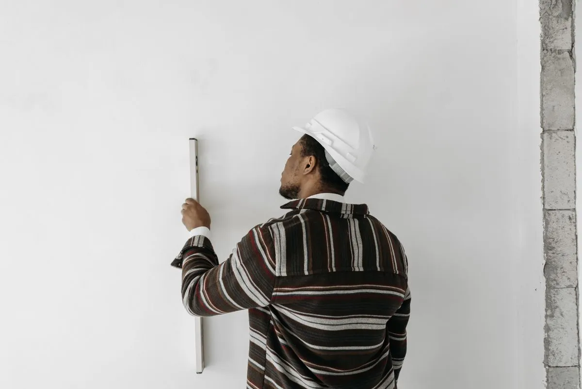 Sheetrock hanging and finishing inside a modern kitchen renovation