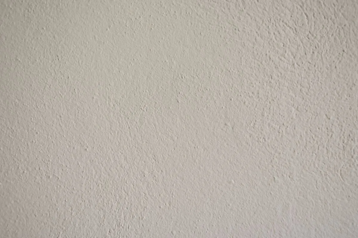 Finished drywall ceiling with clean paint-ready surface