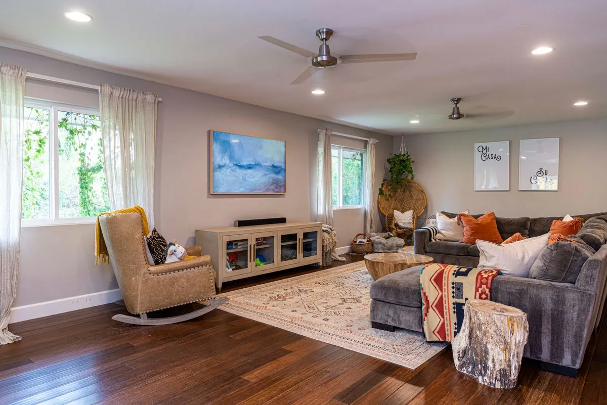 Ceiling fan installation in a modern bedroom with clean wiring