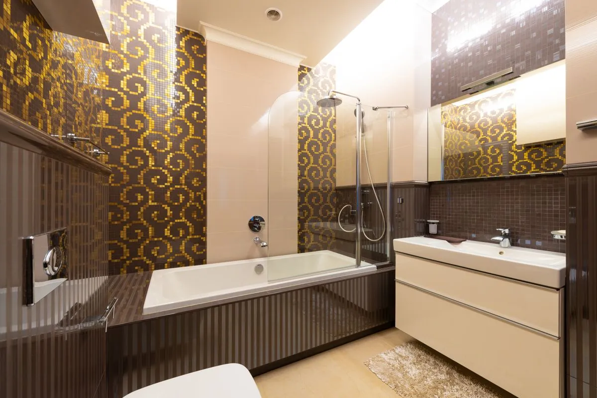 Modern shower tile installation with large-format gray porcelain