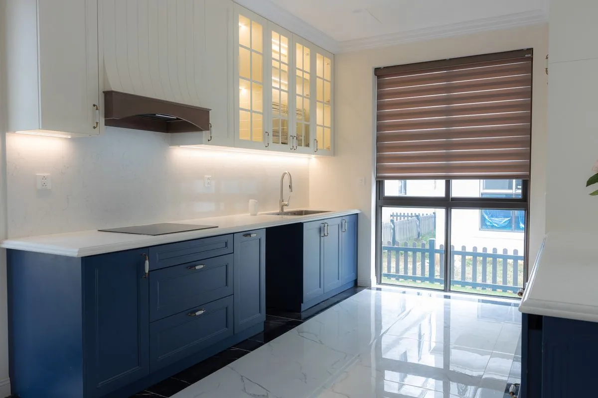Kitchen remodel on a budget featuring cabinet refacing and updated hardware