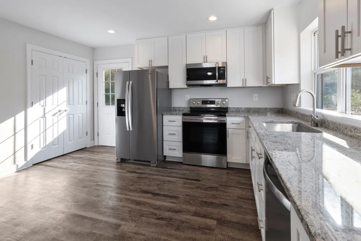 Basement remodel converted into a bright family entertainment room