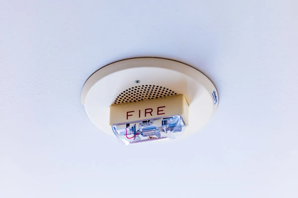Retail surveillance cameras covering checkout counters and store entrances