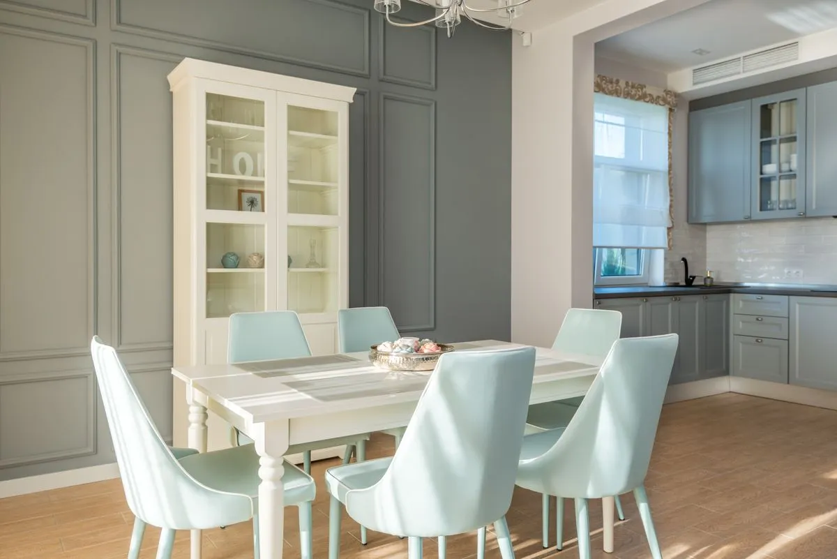 Smooth kitchen cabinet refinishing result with matte white finish
