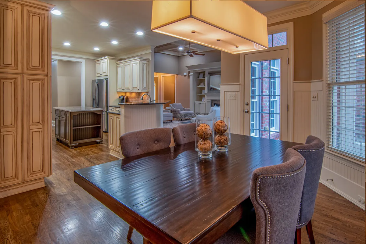 Refinished kitchen cabinets with updated hardware and clean lines