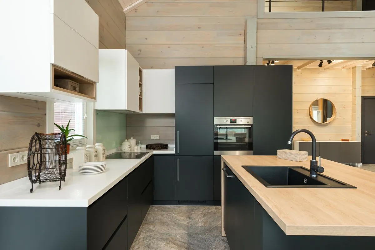 Freshly refinished kitchen cabinets with a smooth painted finish