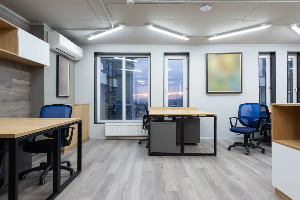 Office painting service in an open-plan workspace
