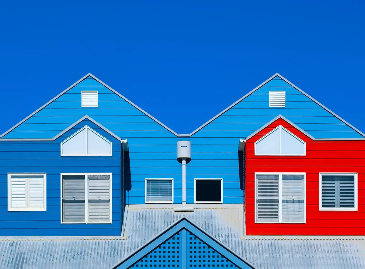 Freshly painted suburban home exterior with crisp trim and modern color contrast