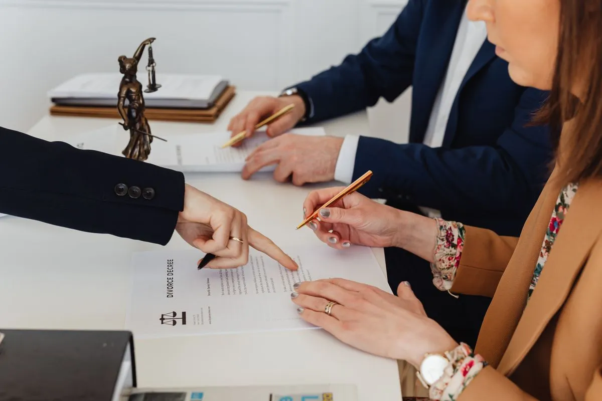 Family law attorney desk with case files and legal documents
