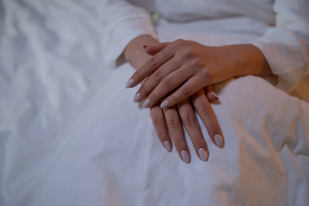 Short acrylic nails with a clean natural look