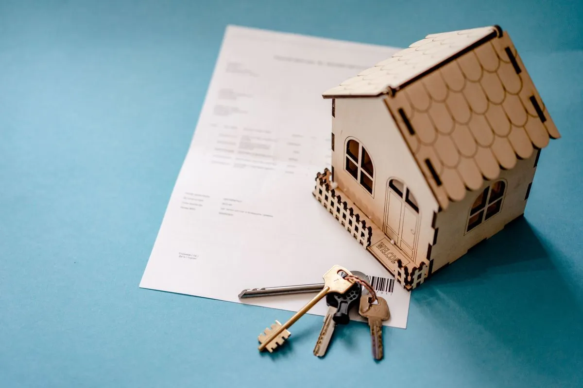 Property management company team reviewing rental portfolio reports